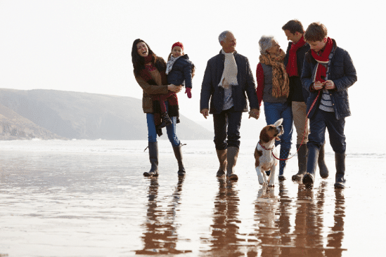 Family walking on the beach